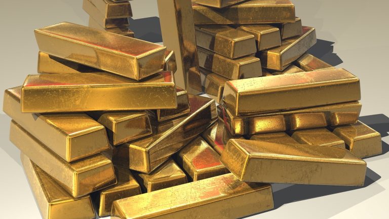 A pile of stacked gold bars
